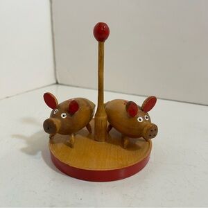 Vintage kitschy wooden pig salt and pepper shaker on stand